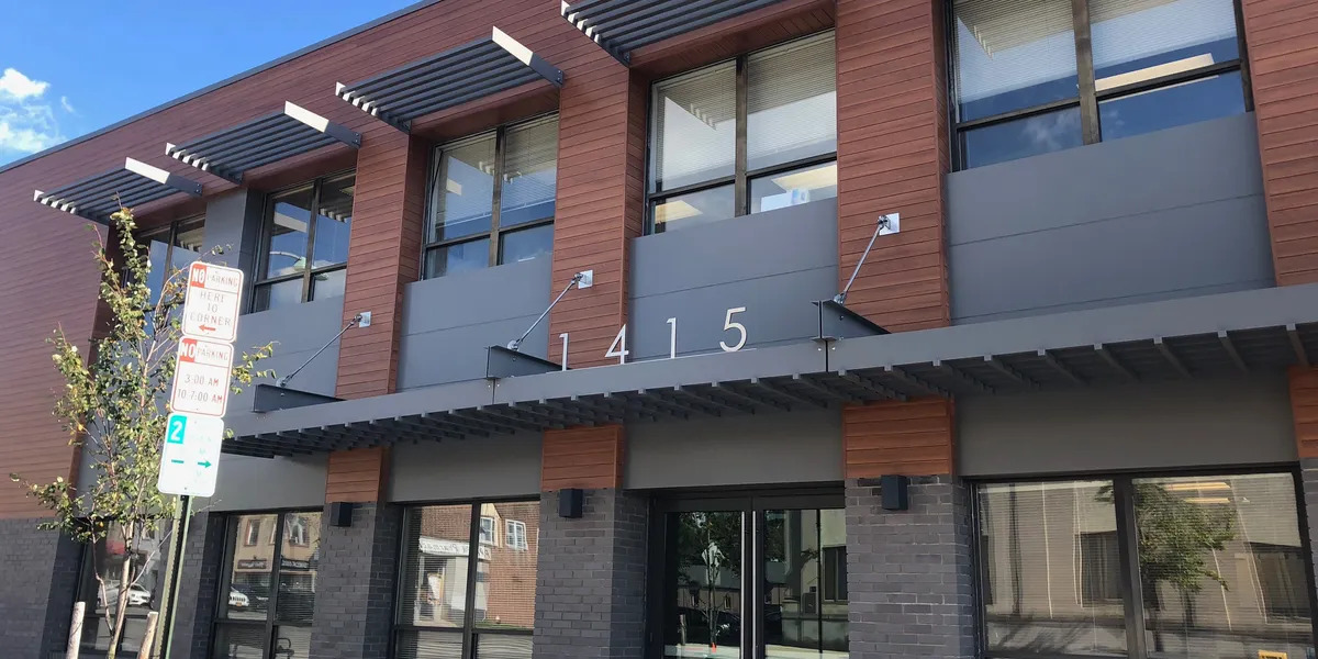 Beekman Estate building at 1415 Queen Anne Road, Teaneck, NJ, housing Ambra Corporation office renovated by DDB Contracting