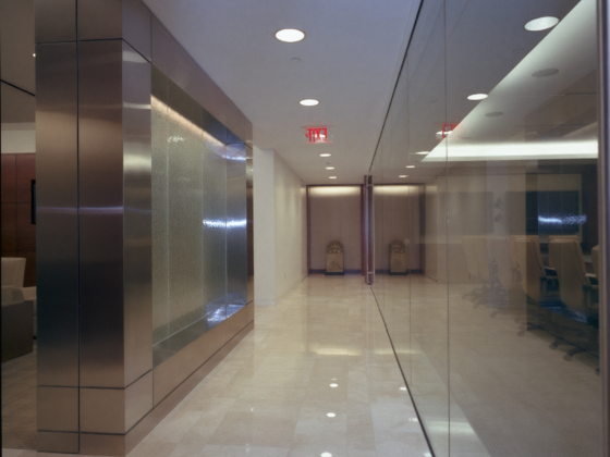 Law office hallway at Herrick Feinstein LLP completed by DDB Contracting, commercial interior contractor specializing in legal office tenant fit-outs.