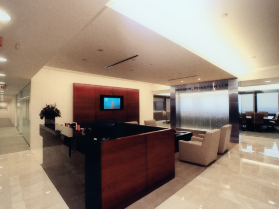 Herrick Feinstein LLP corporate law office reception in Newark, New Jersey renovated by DDB Contracting, a commercial contractor specializing in law firm office renovations