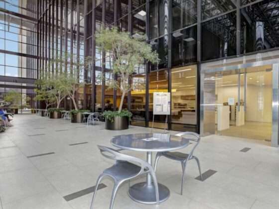Office atrium renovation in New Jersey featuring café seating at 379 Thornall Café, completed for Alfieri by DDB Contracting
