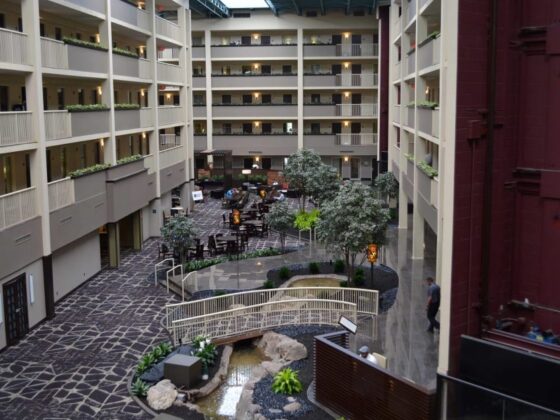 Wide-angle view of the renovated lobby at Embassy Suites Philadelphia, showcasing modern design and finishes as part of a commercial construction and hotel renovation project completed by DDB Contracting for Remington Hospitality.