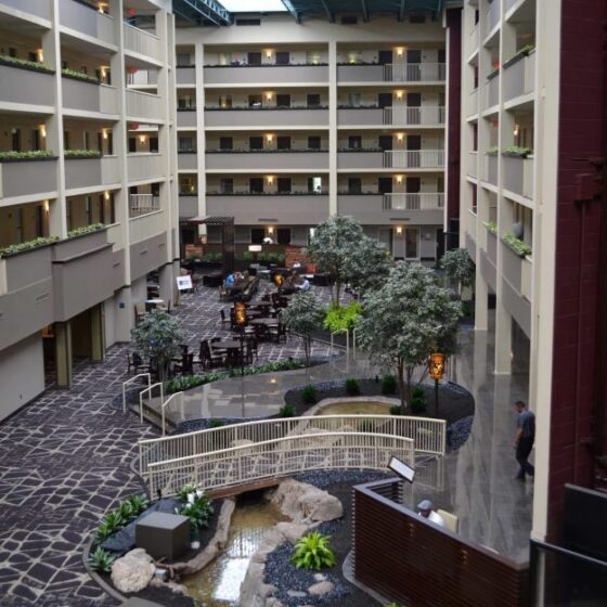 Wide-angle view of the renovated lobby at Embassy Suites Philadelphia, showcasing modern design and finishes as part of a commercial construction and hotel renovation project completed by DDB Contracting for Remington Hospitality.