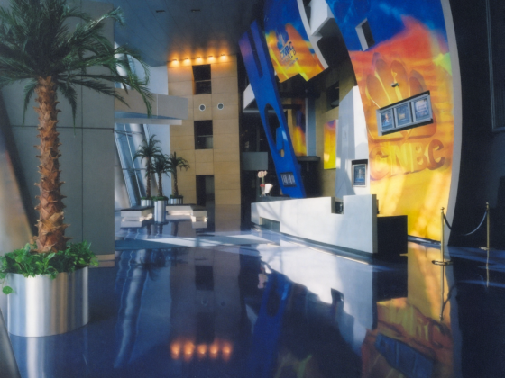 Reception area at CNBC Media building renovated by DDB Contracting, a corporate commercial contractor specializing in office renovations