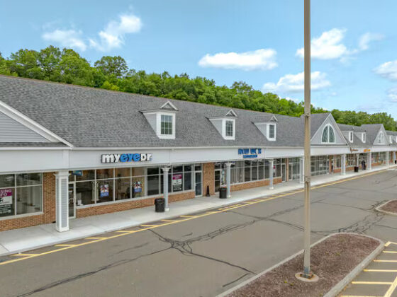 Exterior view of Sandhill Plaza, a retail shopping center in Newtown, Connecticut, undergoing renovation by DDB Contracting.